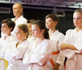 Portrait of kids posing before training at karate class